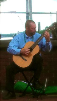 Charles Van Deursen Playing Classical Guitar Along the Savannah River