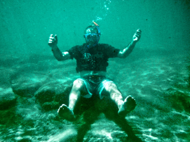 Charles Van Deursen Wearing His LIberty University T-Shirt While Sittine on the Ocean Floor, www.InTuneWithYou.com