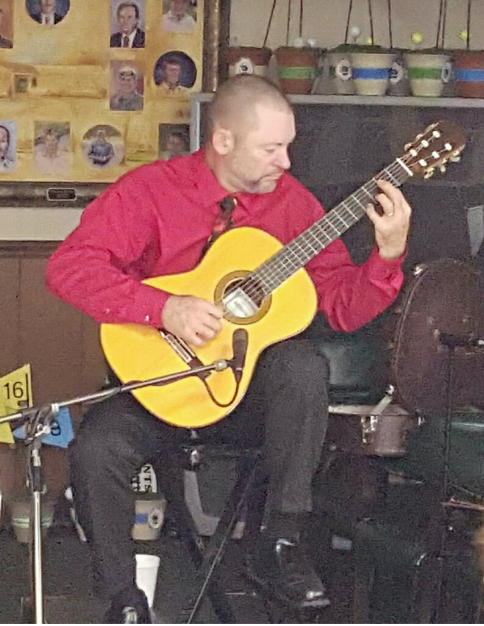 Charles Van Deursen Playing the Classical Guitar for a Christmas Party in Metter, GA. www.InTuneWithYou.ocm