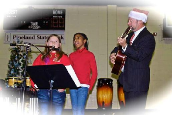 Charles Van Deursen Accompanying Singing Girls at Christmas Celebration in Metter, GA. www.InTuneWithYou.com
