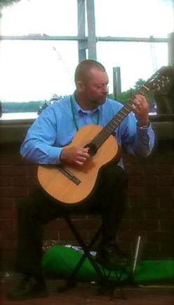 Charles Van Deursen Playing for Tips on River Street in Savannah, GA. www.InTuneWithYou.com